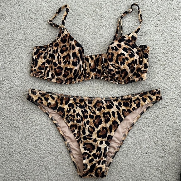 Brand new. Beautiful animal print bikini top and bottom. Never worn! - Picture 1 of 4